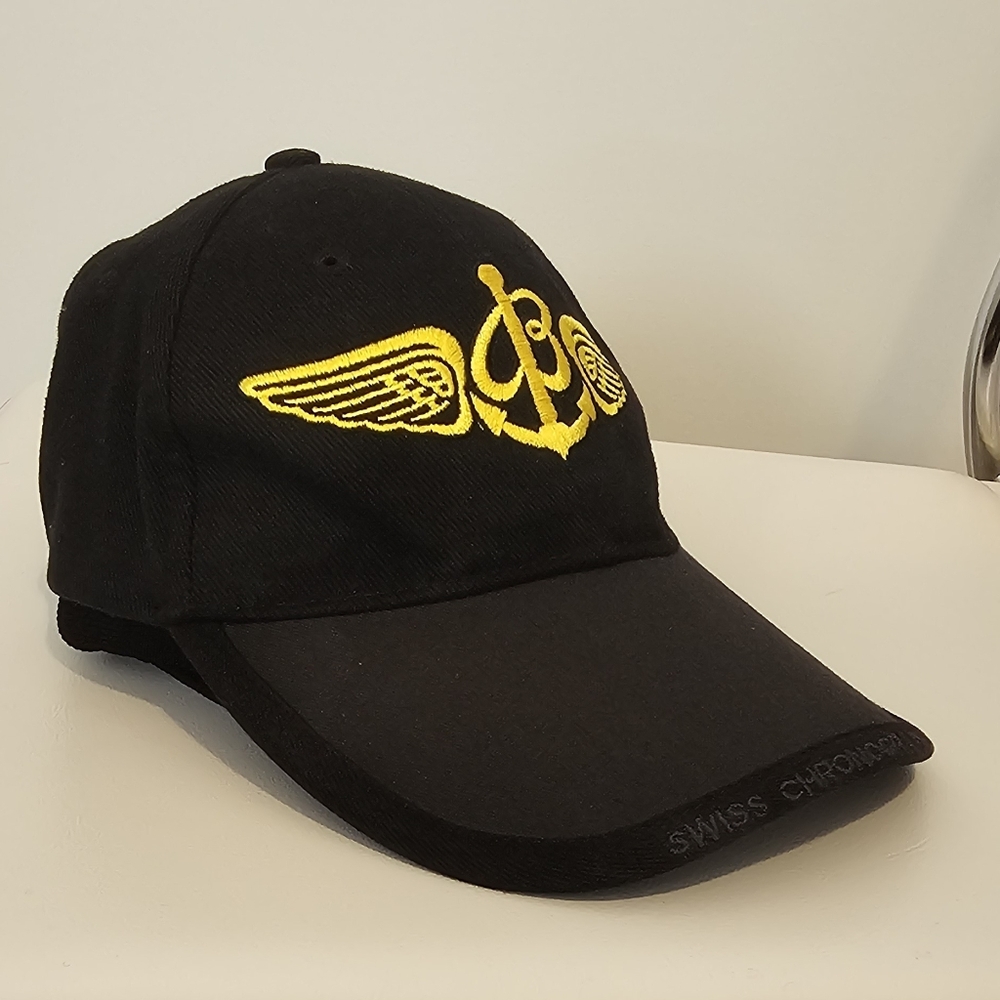 BREITLING  | Baseball Cap. Black With Gold Embroidery Logo. OS Unisex.